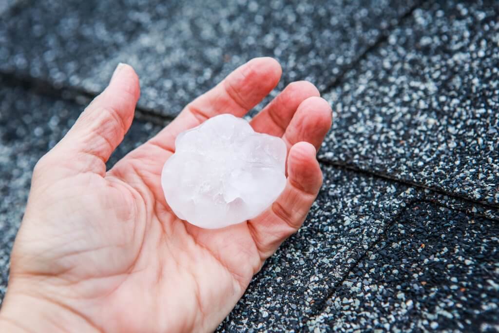 Hail in a hand after hailstorm